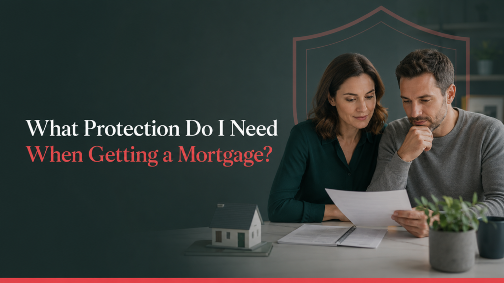 UK couple reviewing mortgage protection documents with a small house model and protective shield, explaining life cover, critical illness cover, and income protection for mortgage buyers.
